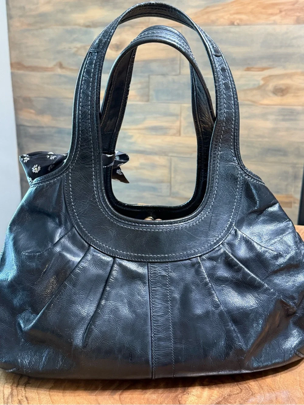 Coach Ergo Black Leather Satchel with Floral Bow Accent . Only callout on strap